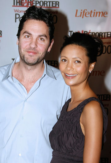 Actress Thandie Newton and her husband, screenwriter Oliver Parker (L), arrive as guests at the