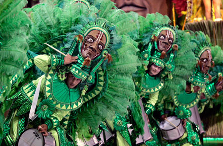 Members of Kamarr carnival group perform during the annual El Carnaval del Pais (country's carnival) in Gualeguaychu, some 230 km (143 miles) north of Buenos Aires, January 6 , 2007.