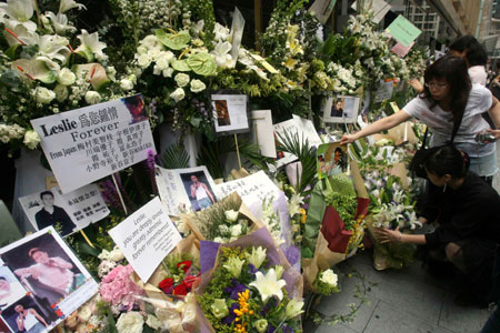 Fans of the late Hong Kong superstar Leslie Cheung place flowers outside the hotel, where Cheung committed suicide, in Hong Kong April 1, 2007, to mark the fourth anniversary of his suicide. Cheung, one of Asia's most enduring stars, died at the age of 46 and left behind a suicide note widely believed to have revealed emotional problems.
