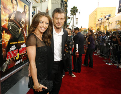 Actors Rebecca Gayheart (L) and Eric Dane pose at the premiere of