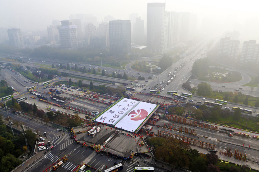 中國日報11月影像回眸:你不能對周圍世界熟視無睹