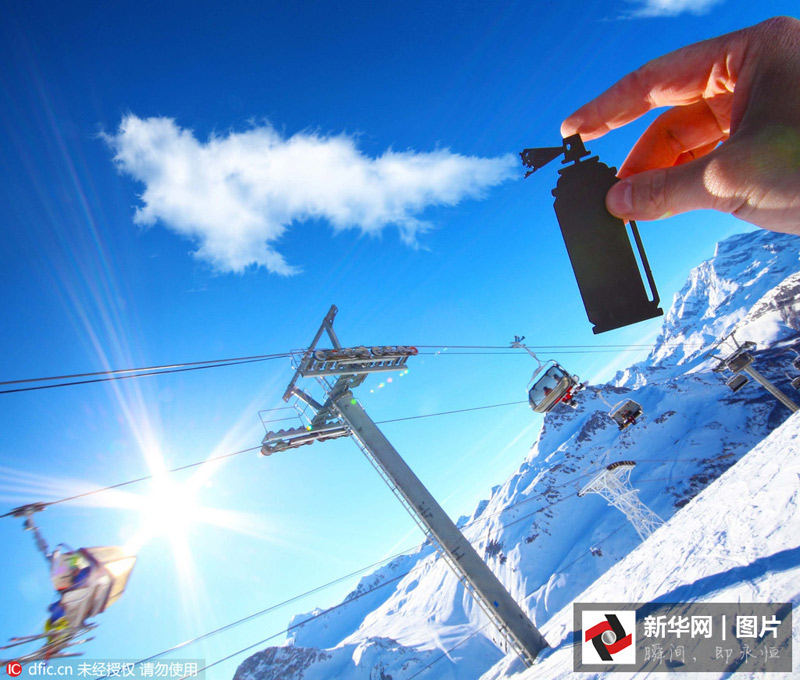 藝術家剪紙錯位攝影 度假勝地變創意作品趣味十足（組圖）