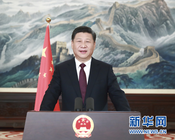 專家點評:“擼起袖子加油干”有幾種譯法?