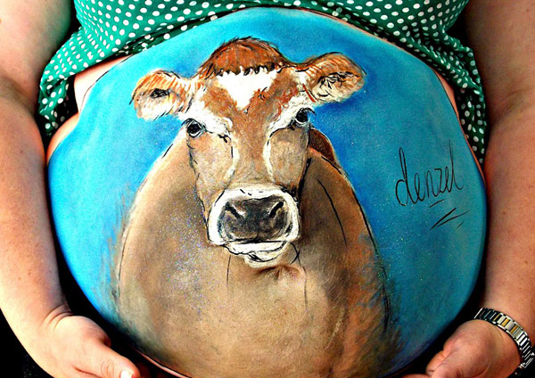 英藝術家孕婦肚皮上涂鴉紀念美好過程（組圖）