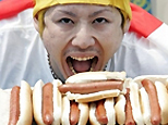 Japanese Champ scoffed 53 hotdogs