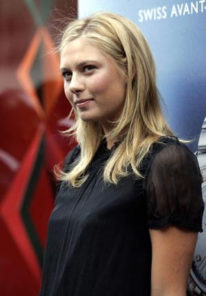 Maria Sharapova poses before launching her new TAG Heuer watch 