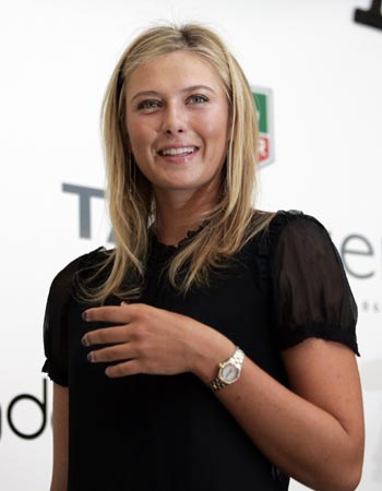 Maria Sharapova poses before launching her new TAG Heuer watch