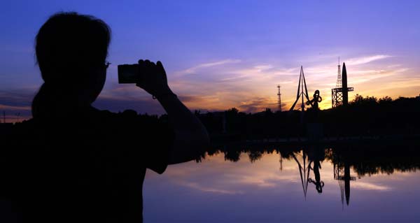 The setting sun creates a mysterious hue over the skies at the satellite launch center, which is the main draw of the city of Jiuquan in Gansu province. Photos by Zou hong / CHina Daily Home of space dreams