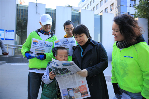 Beijing cycling tour promotes China Daily