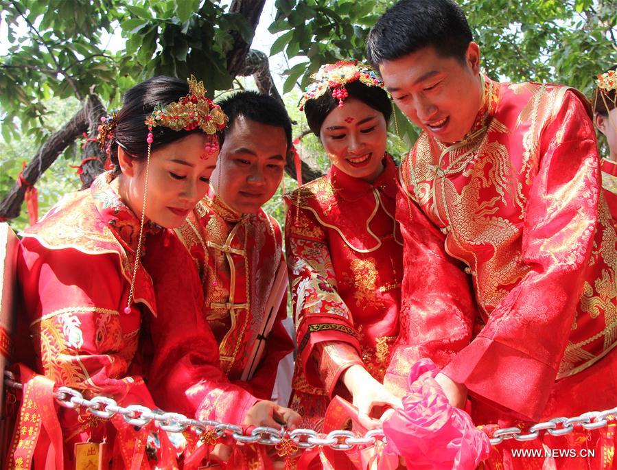Look of love: Many Chinese couples get married on May 20