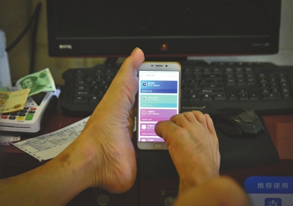 Armless man uses feet as adeptly as hands