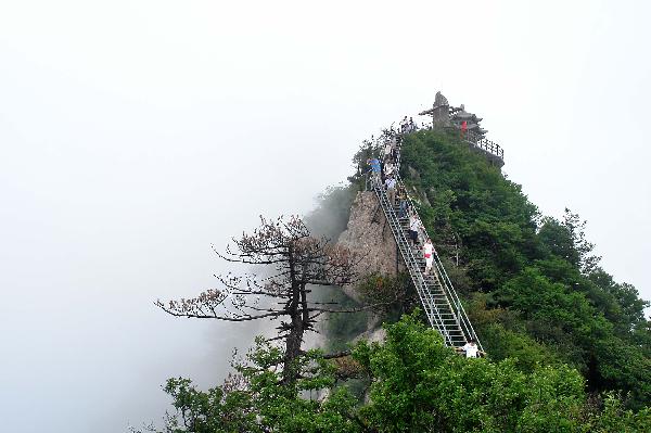 Laojunshan Mountain shrouded by fog in China's Henan