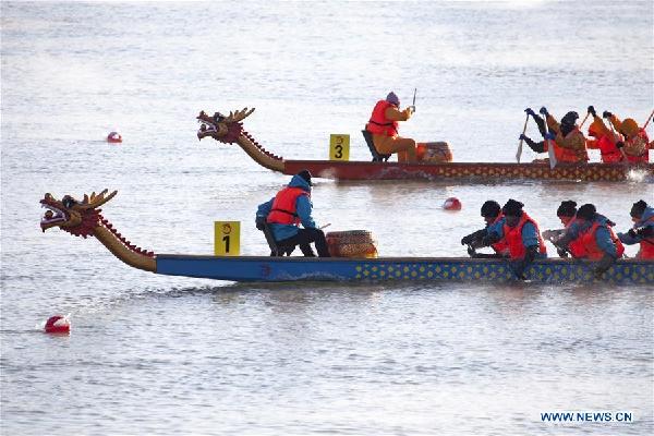 Winter dragon boat race held in NE China's Jilin