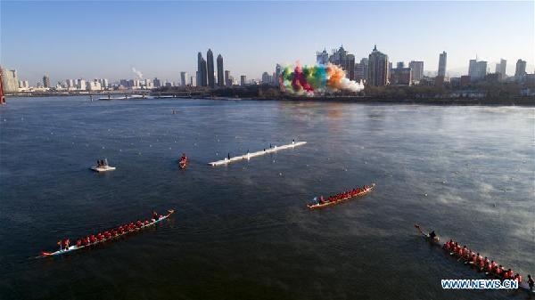 Winter dragon boat race held in NE China's Jilin