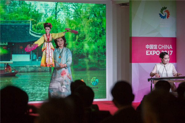 人在世博丨“翻作花間舞 偶旋扇底風”