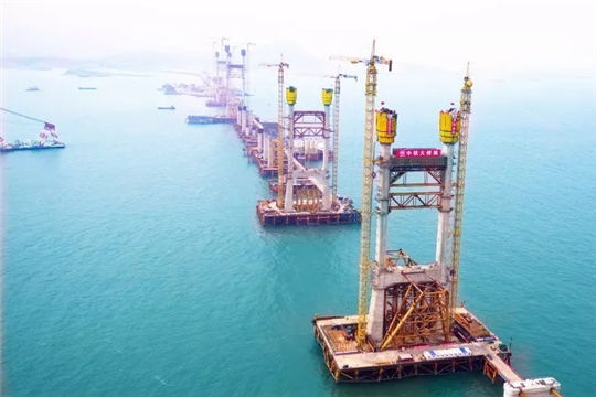 Construction of China's first cross-sea rail-road bridge progresses