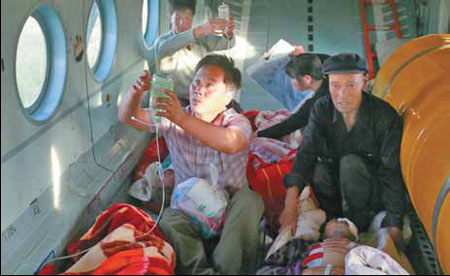 Patients transferred to Lanzhou as local hospitals fill