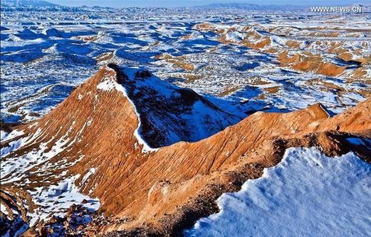 In pics: snow scenery of Danxia landform in NW China's Gansu