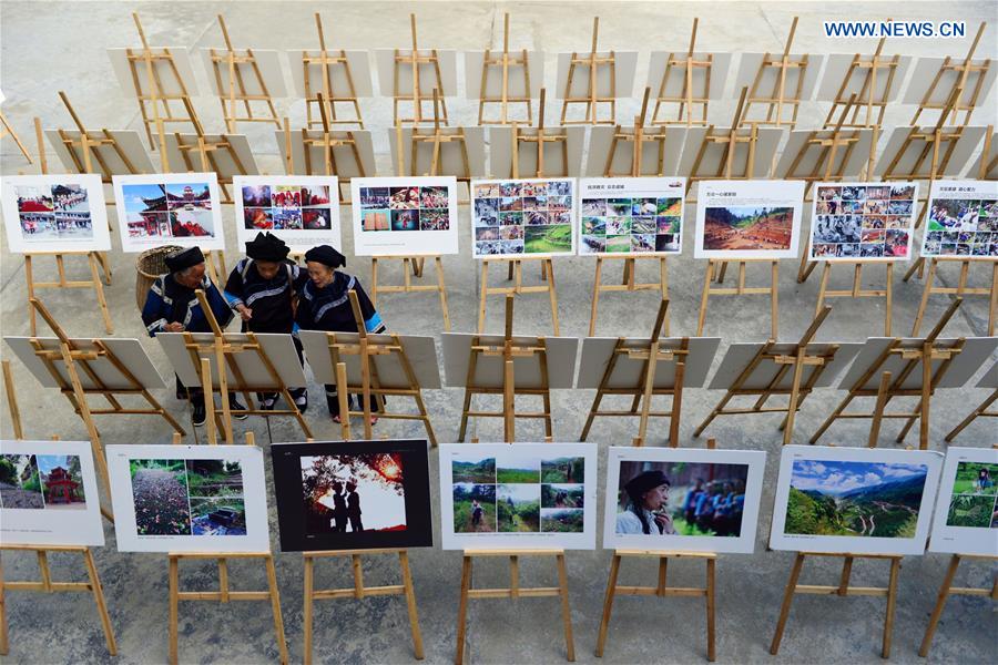 Photo exhibition on customs, life of villagers held in S.W. China