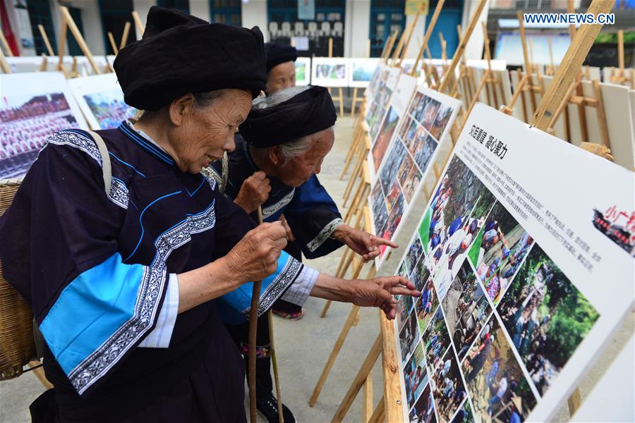 Photo exhibition on customs, life of villagers held in S.W. China