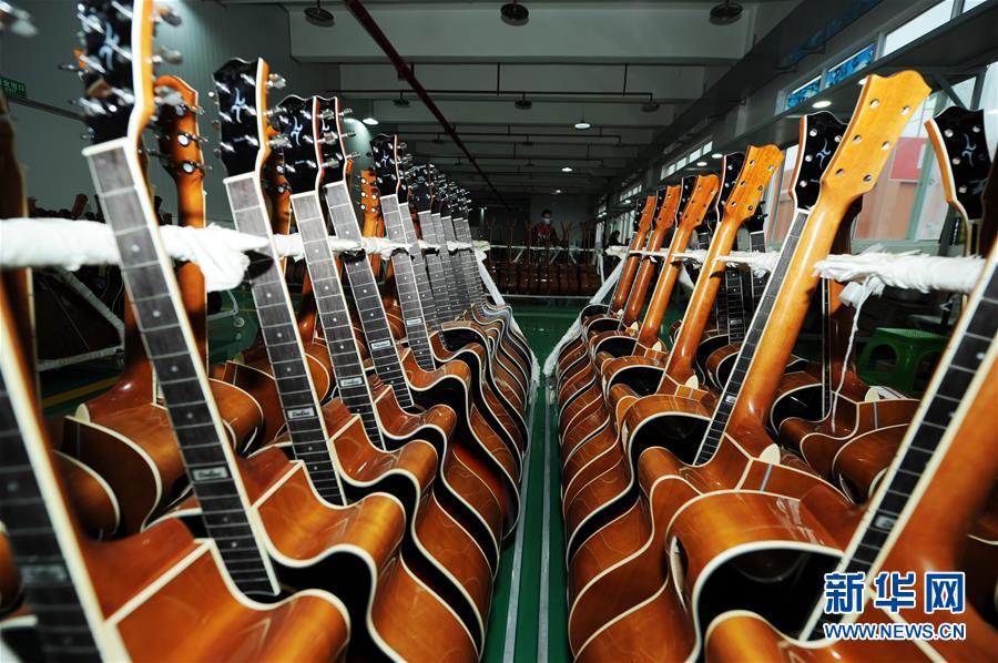 Guitar making aids poverty alleviation