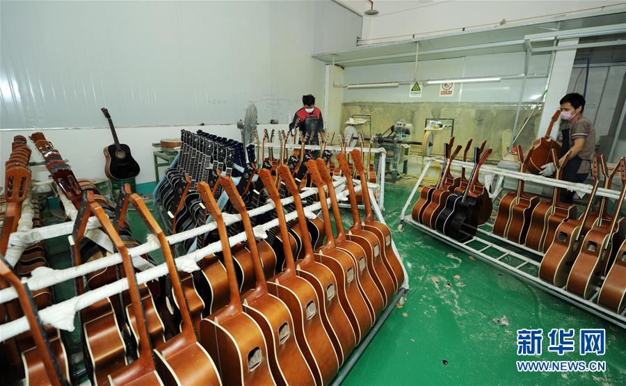 Guitar making aids poverty alleviation