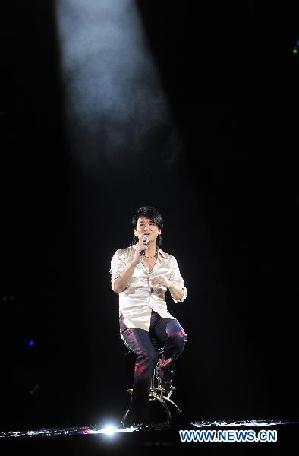 Singer Emil Chau performs at concert in Wuhan