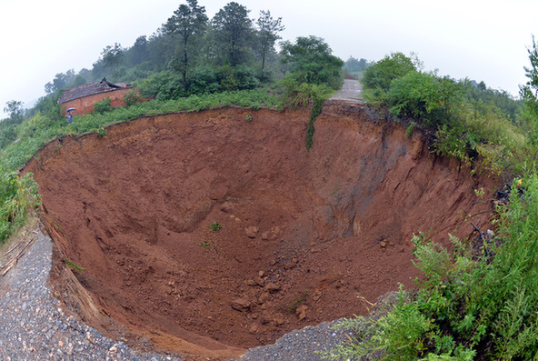 Giant sinkholes plague Hubei mining region