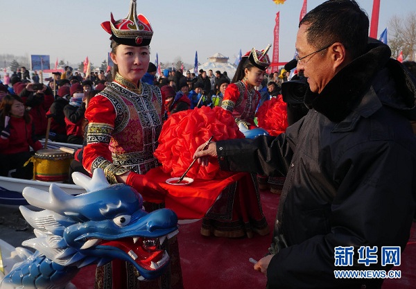 Dragon boating held in Duolun on ice-covered lake