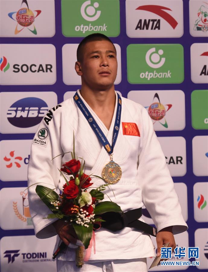 Saiyin Jirigala gives home crowd China's first gold medal