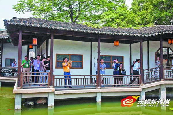 In photos: Native Wuxi elites tour the city
