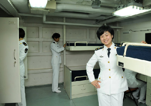 Women soldiers inside their dormitory in Liaoning aircraft carrier berthing at a naval base in Qingdao, on April 18, 2013. Life below deck on China's first aircraft carrier