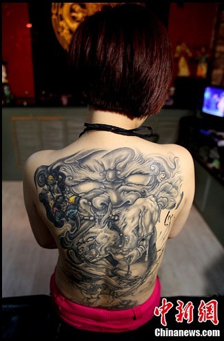 Tattoo artist in China
