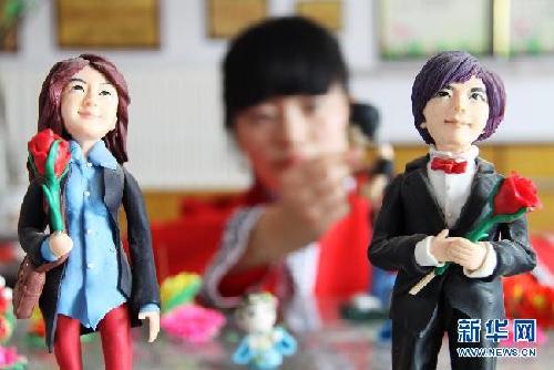 Dough figurines pinched for Chinese Valentine's Day