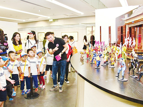 Graduates display art creations at an exhibition