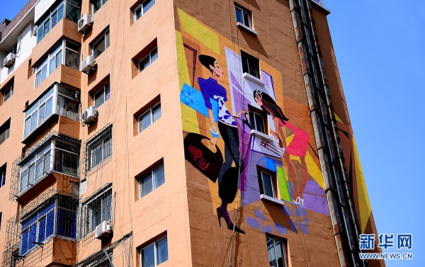 Pictures of girls printed on walls in Shenyang