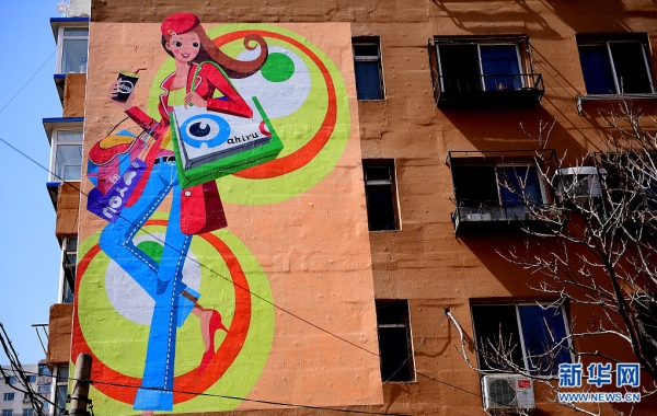 Pictures of girls printed on walls in Shenyang