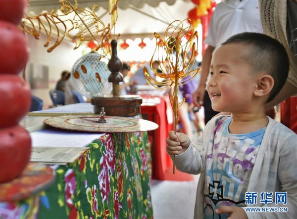 Intangible cultural heritage event opens in Shenyang