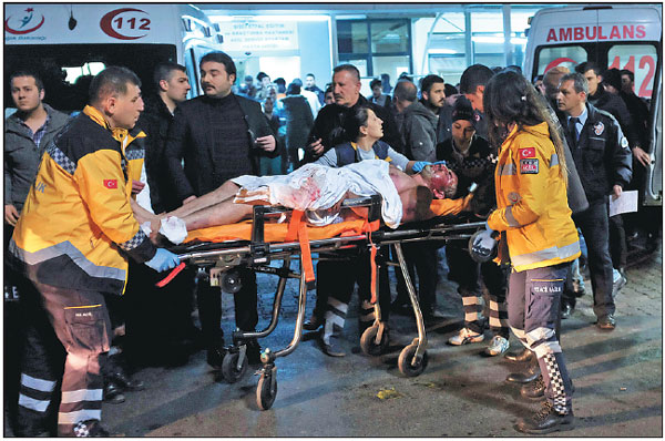 Turkey mourns as bombs near stadium kill 38