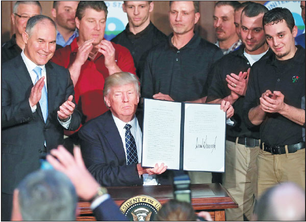 Climate order draws praise, threats