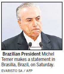 Bad news piles up for beleaguered Temer as ally leaves government