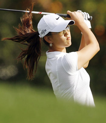 Michelle Wie of the U.S. hits her second shot on the second hole at the LPGA Kraft Nabisco Championships golf tournament in Rancho Mirage, California March 30, 2006.