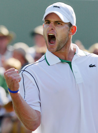 Andy Roddick of the U.S. celebrates after winning the second set at his quarter-final tennis match against David Ferrer of Spain at the Nasdaq-100 Open in Key Biscayne, Florida March 30, 2006.