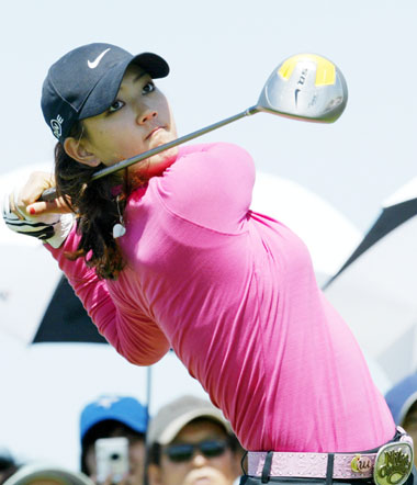 American golfer Michelle Wie looks at her driver shot on the 3rd hole of the SK Telecom Open 2006 golf tournament at the Sky 72 Golf Club in Inchon, west of Seoul, May 7, 2006.