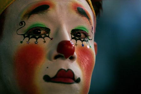 A clown poses for a picture during the International Clown Convention in Mexico City October 17, 2006. 