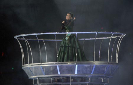 Lea Salonga of the Philippines performs in Khalifa Stadium during the closing ceremony for the 15th Asian Games in Doha December 15, 2006. 
