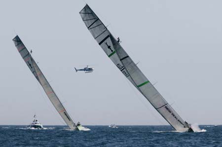 America's Cup Challengers Desafio Espanol 2007 of Spain (L) and Emirates Team New Zealand race upwind during their semi-final Race 1 at the Louis Vuitton Cup in Valencia May 14, 2007.