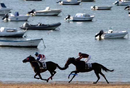Race along the beach in Spain