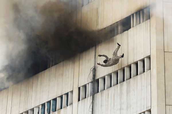 Men fall from building inferno