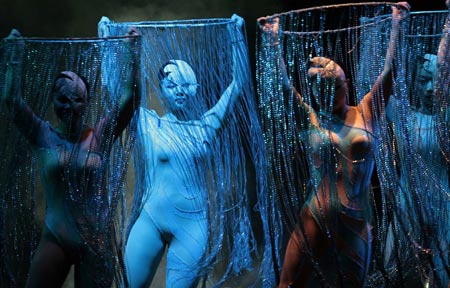 Members of the Zunyi Acrobatic Troupe from the Chinese National Acrobatic Circus perform during a show in Roquetas de Mar, southeast Spain, late August 12, 2007. 